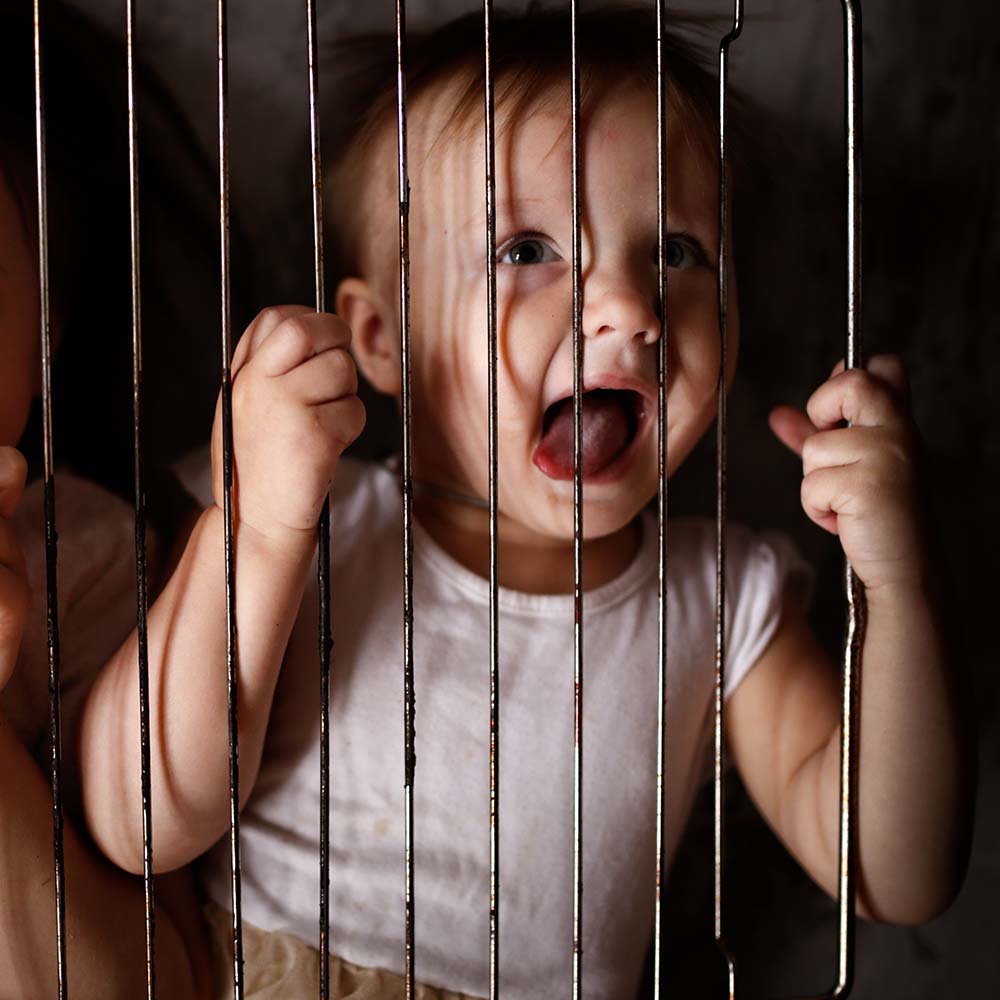 children-in-a-cage-the-concept-of-restriction-of-TZH7C8Q.jpg